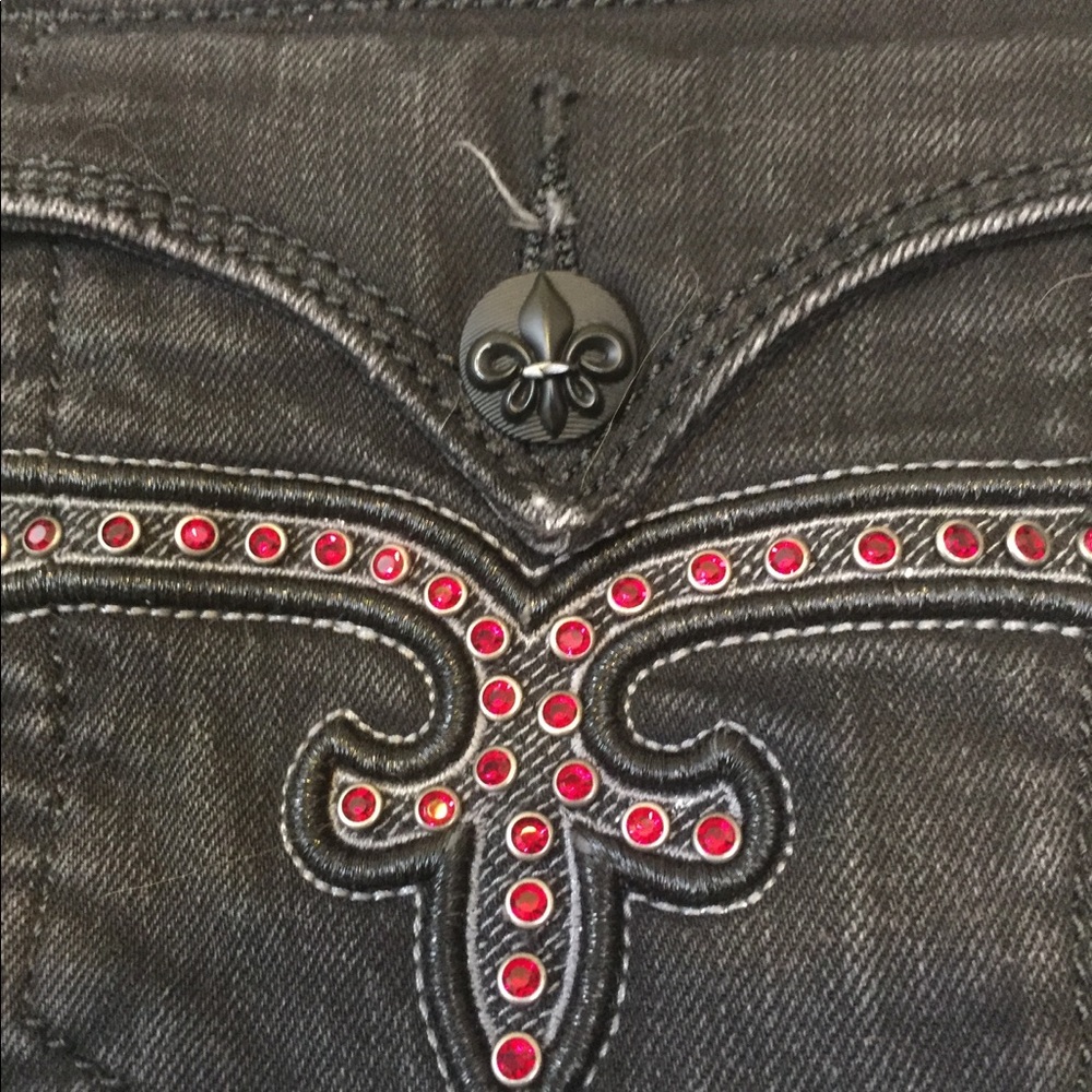 Distressed black rock revival  with red stones